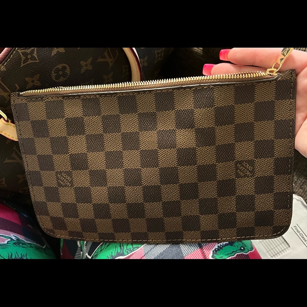 Brown LV clutch bag